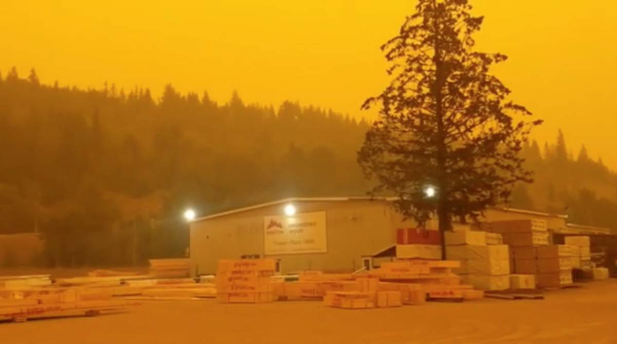 An orange haze descends upon Prince George, British Columbia, Canada, as smoke continue to drift over from the wildfires, August 15, 2018, in this still image taken from a video obtained from social media.