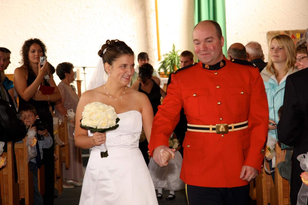 Officer Graeme Kingdon with his wife, Nakella, on their wedding day.