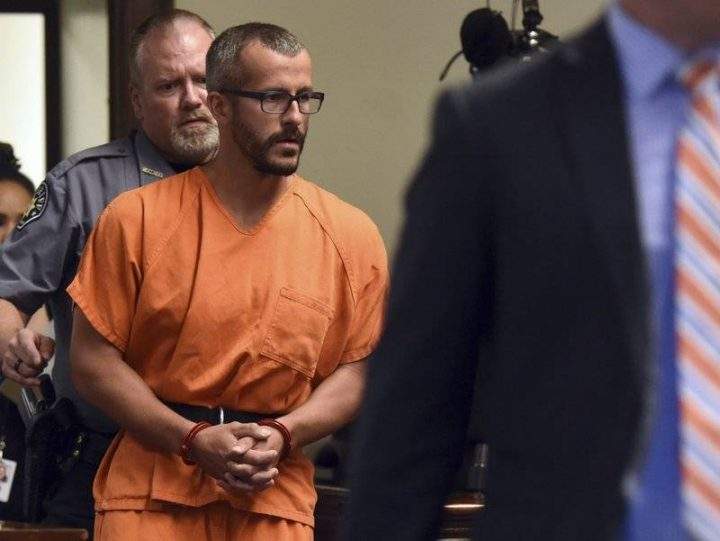 In this Aug. 16, 2018, file photo, Christopher Watts is escorted into the courtroom before his bond hearing at the Weld County Courthouse in Greeley, Colo. Charges were filed Monday, Aug. 20, 2018, against 33-year-old Watts in the deaths of his pregnant wife and their two young daughters.