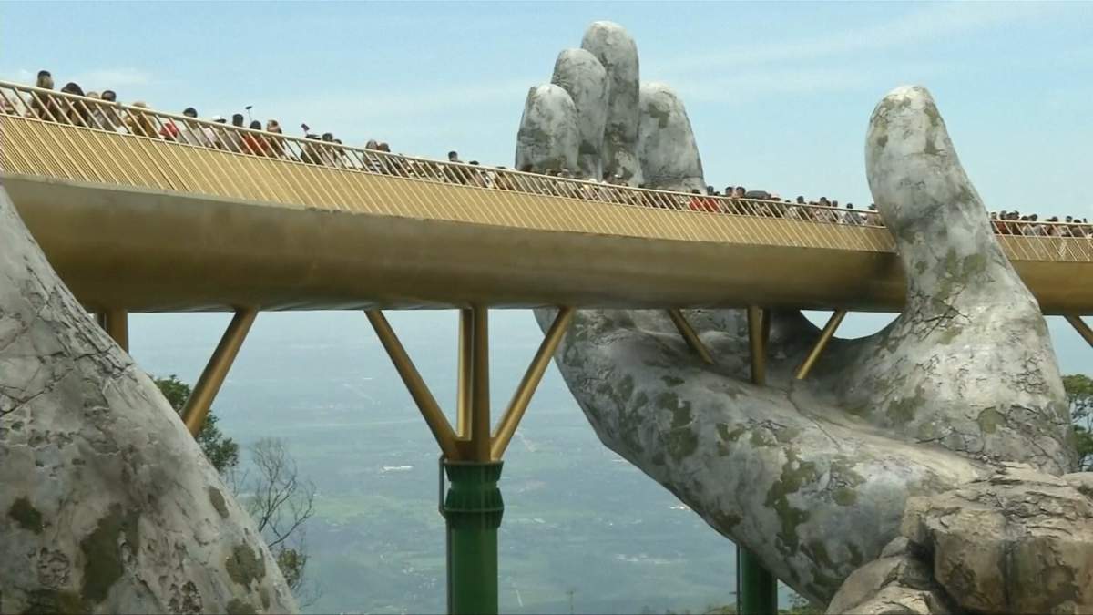 A look at Vietnam’s ‘Golden Bridge,’ a colossal pair of hands lifting a golden walkway - image