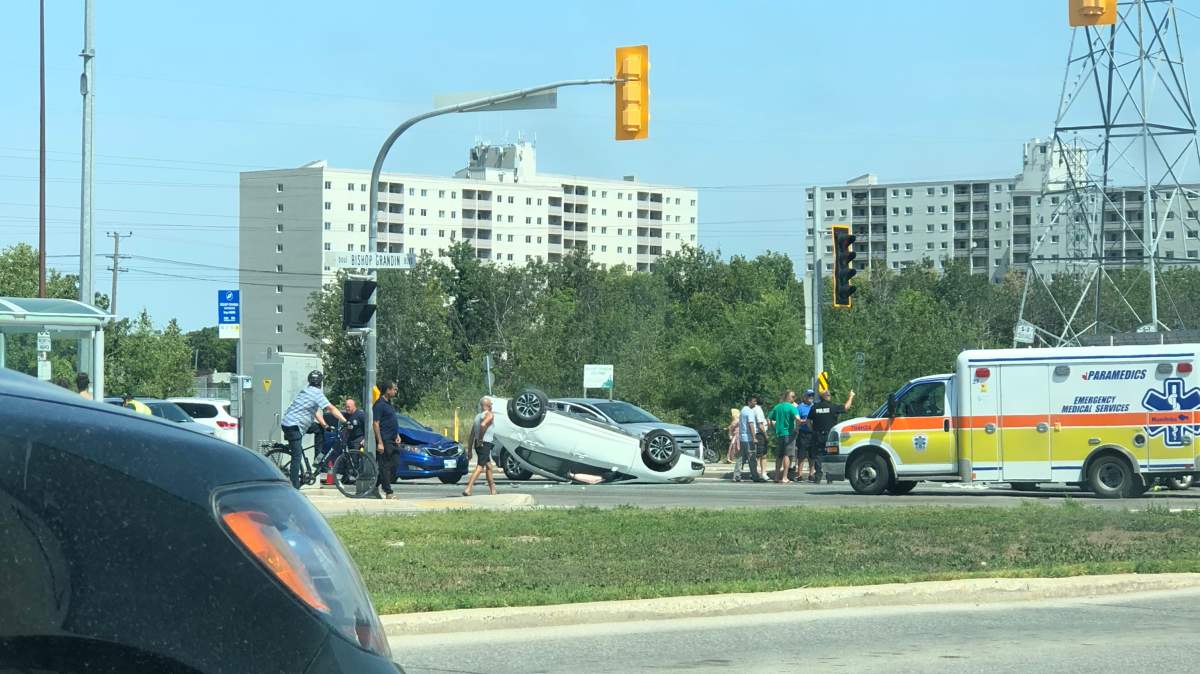 A vehicle rests on its roof on Dakota Street in St. Vital Friday, Aug. 3, 2018. Nicole Williamson/Submitted