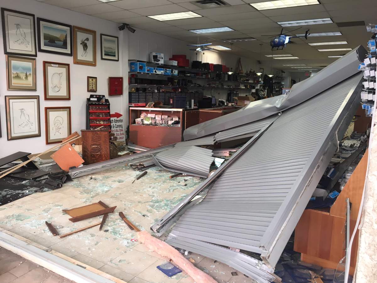 A U-Haul van crashed into South Edmonton Coin & Currency at 57 Avenue and 111 Street Tuesday, Aug. 7, 2018.