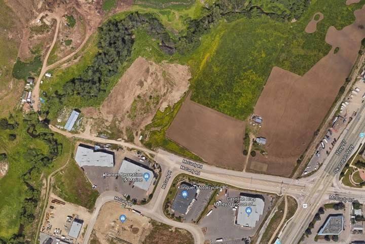 A satellite view of the barn and nearby businesses, that houses piles of garbage near McCurdy Road and Highway 97 in Kelowna.