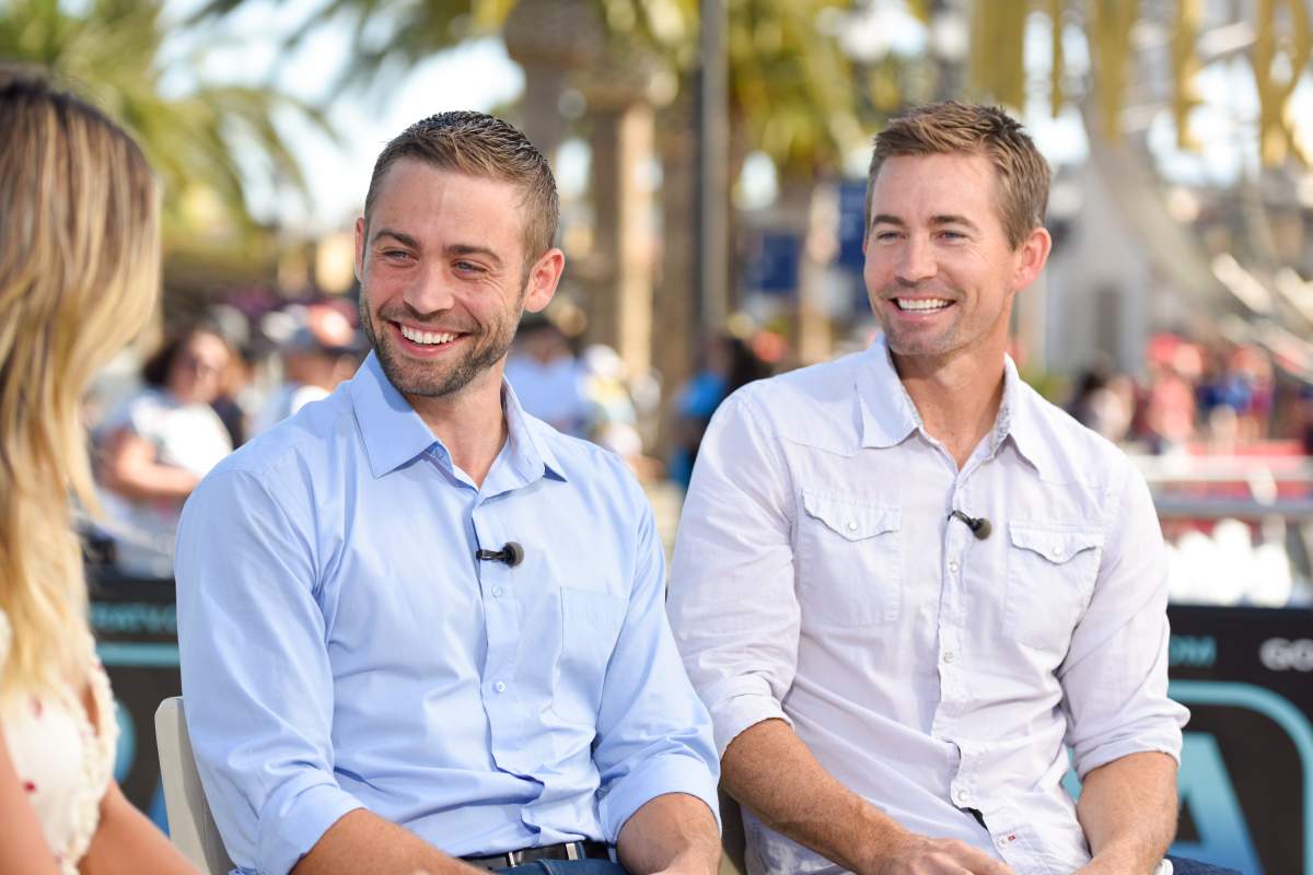 Paul Walker's brothers, Cody (L) and Caleb Walker, visit 'Extra' at Universal Studios Hollywood on Aug. 8, 2018 in Universal City, California.