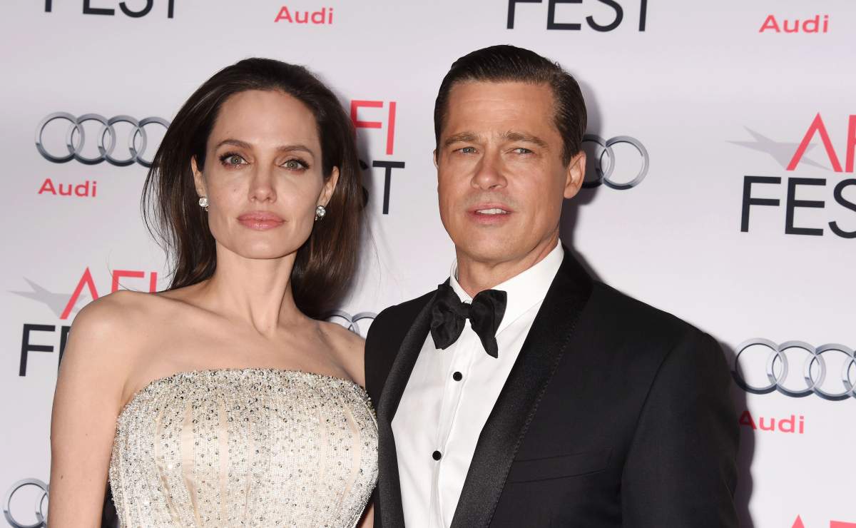 Angelina Jolie (L) and actor-producer Brad Pitt arrive at the AFI FEST 2015 presented by Audi Opening Night Gala Premiere of Universal Pictures' 'By The Sea' at TCL Chinese 6 Theatres on Nov. 5, 2015 in Hollywood, California.