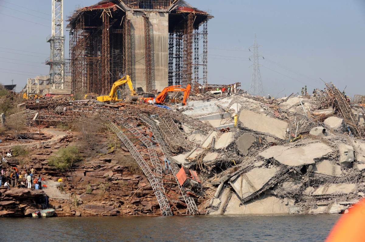 Dozens of labourers fell into the water late December 24 when the bridge on which they were working gave way over the Chambal river on the outskirts of the city of Kota in Rajasthan state.
