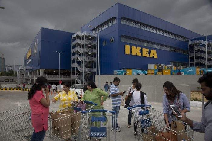 Indian customers stand outside IKEA’s first store in India as it opened in Hyderabad, India, Thursday, Aug. 9, 2018.