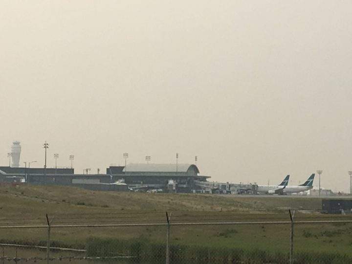 Smoke from the B.C. wildfires has resulted in low visibility at Calgary International Airport.