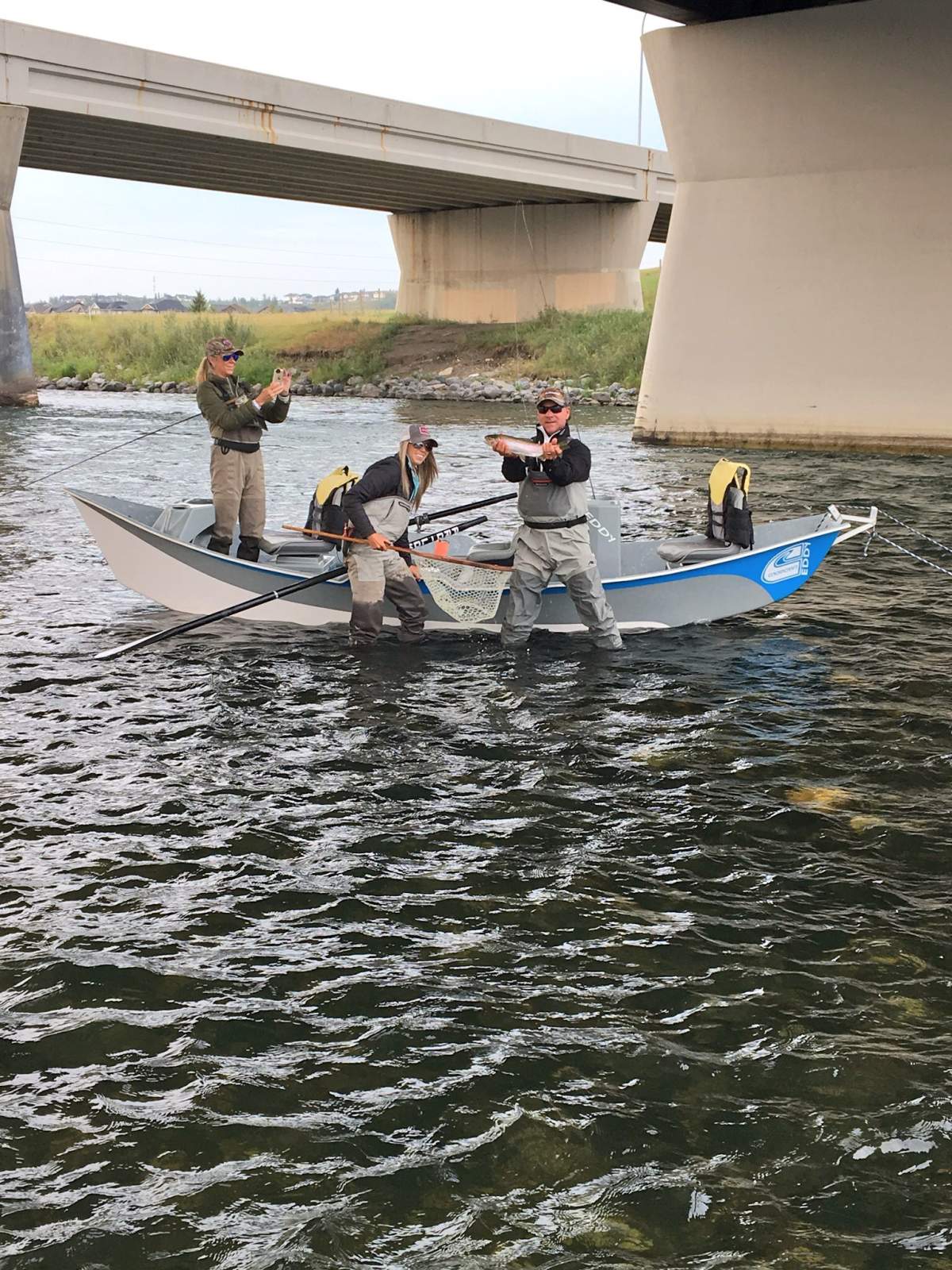Defending champion Scott McCarron and his wife, Jenny, fly-fishing on the Bow River ahead of the Shaw Charity Classic.