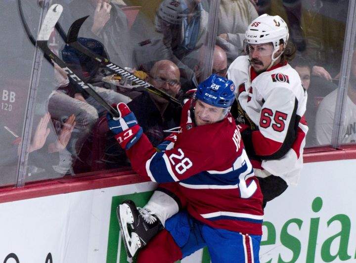 Ottawa Senators’ Erik Karlsson is checked into the boards by Montreal Canadiens’ Jakub Jerabek during second period NHL hockey action in Montreal on November 29, 2017. The Montreal Canadiens traded defenceman Jakub Jerabek to the Washington Capitals for a 2019 fifth-round draft pick Wednesday. Jerabek, a 26-year-old native of the Czech Republic, had a goal and three assists in 25 games this season with Montreal.