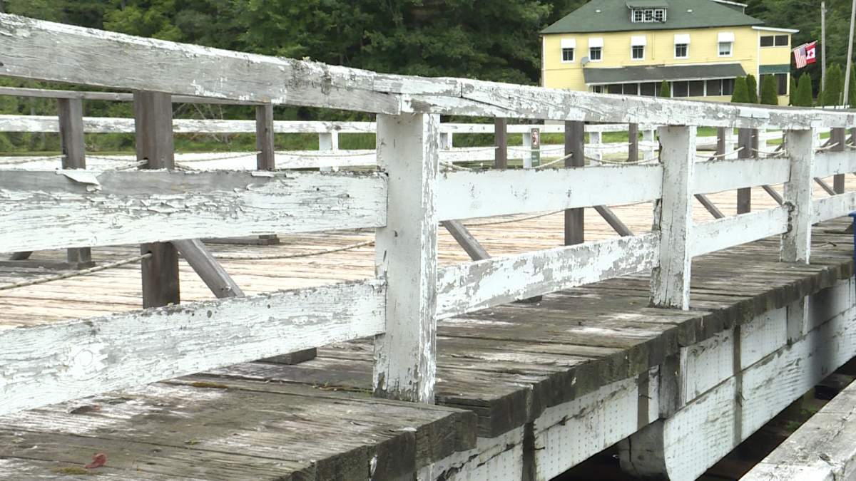 The old wooden bridge, which was built in 1883, will be replaced with a replica, according to Parks Canada.