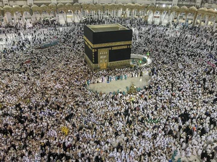 Muslim pilgrims perform the tawaf-e-ifadha circling of the Kaaba, during the annual hajj pilgrimage on the first day of Eid al-Adha in Mecca, Saudi Arabia, Tuesday, Aug. 21, 2018.