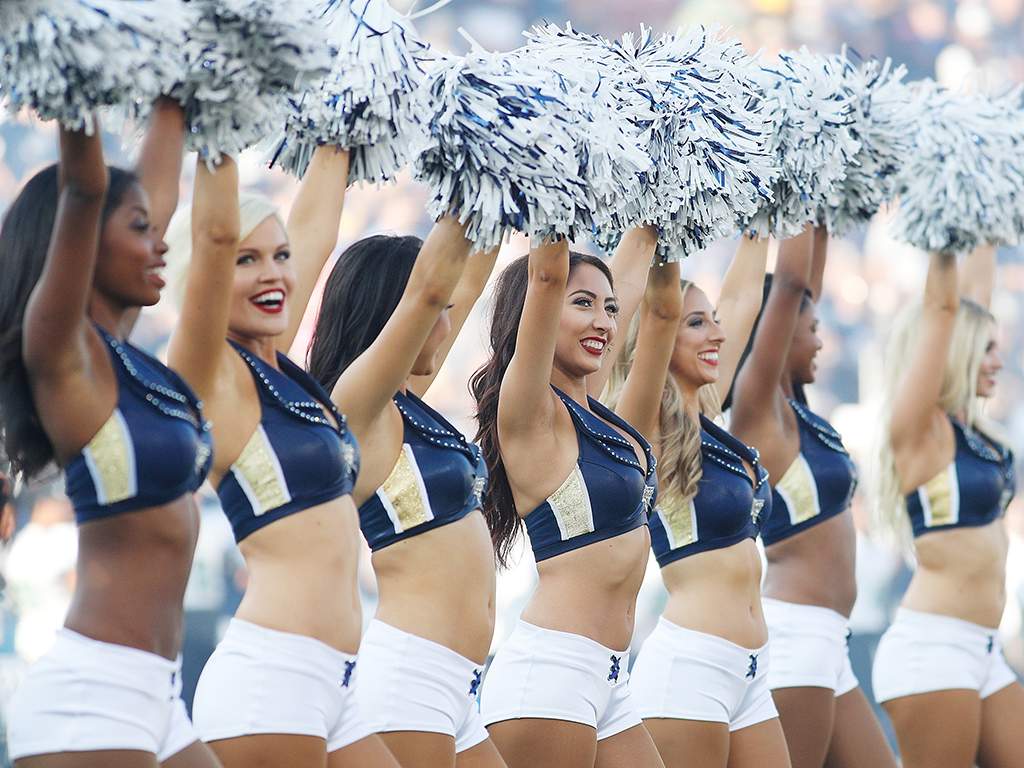 The Rams Cheerleaders stand on the field prior to the start of the preseason game between the Los Angeles Rams and the Dallas Cowboys. Aug. 12, 2017. 