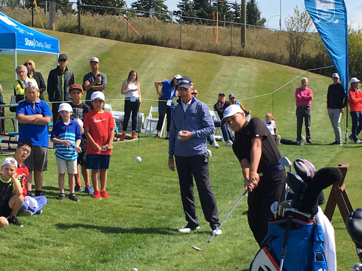 13-year-old Aidan Flynn chipping at Canyon Meadows Golf Club in Calgary. Aug 28th, 2018.