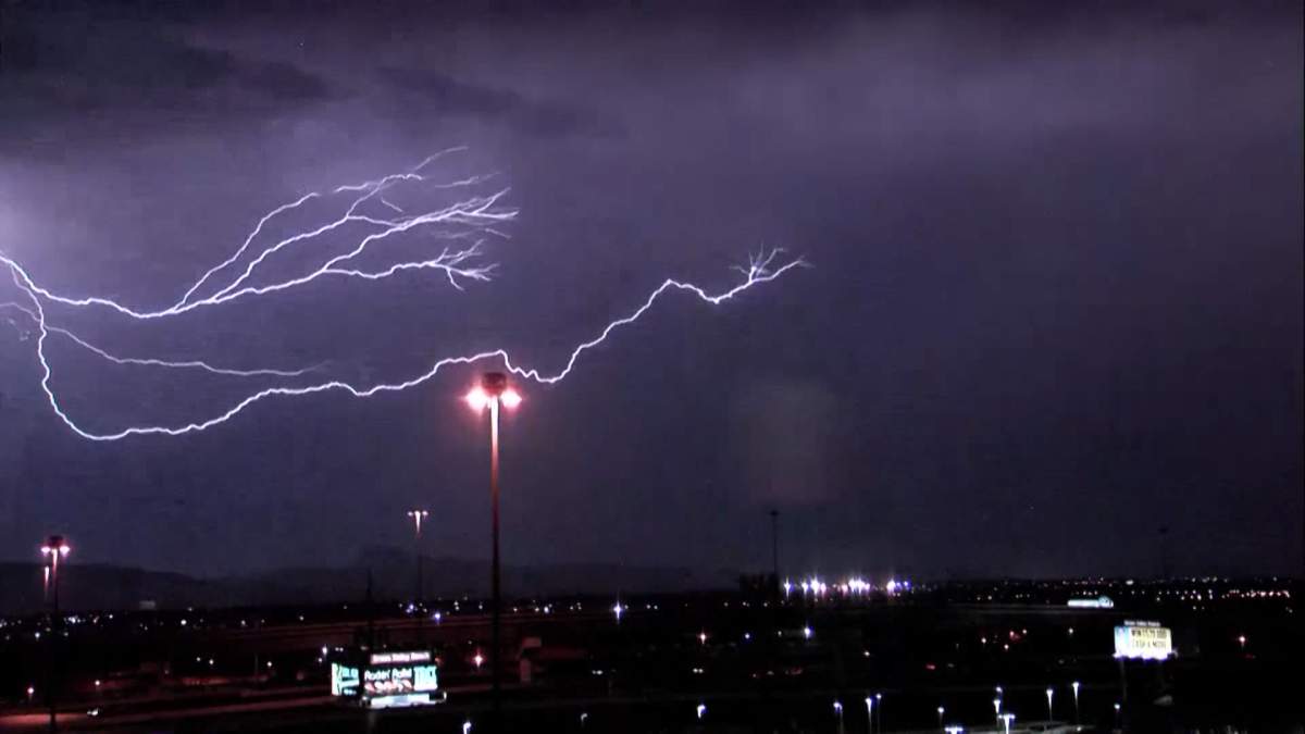 Lightning streaks across the sky above Las Vegas on Saturday, August 11, 2018 as a storm moves through southern Nevada.