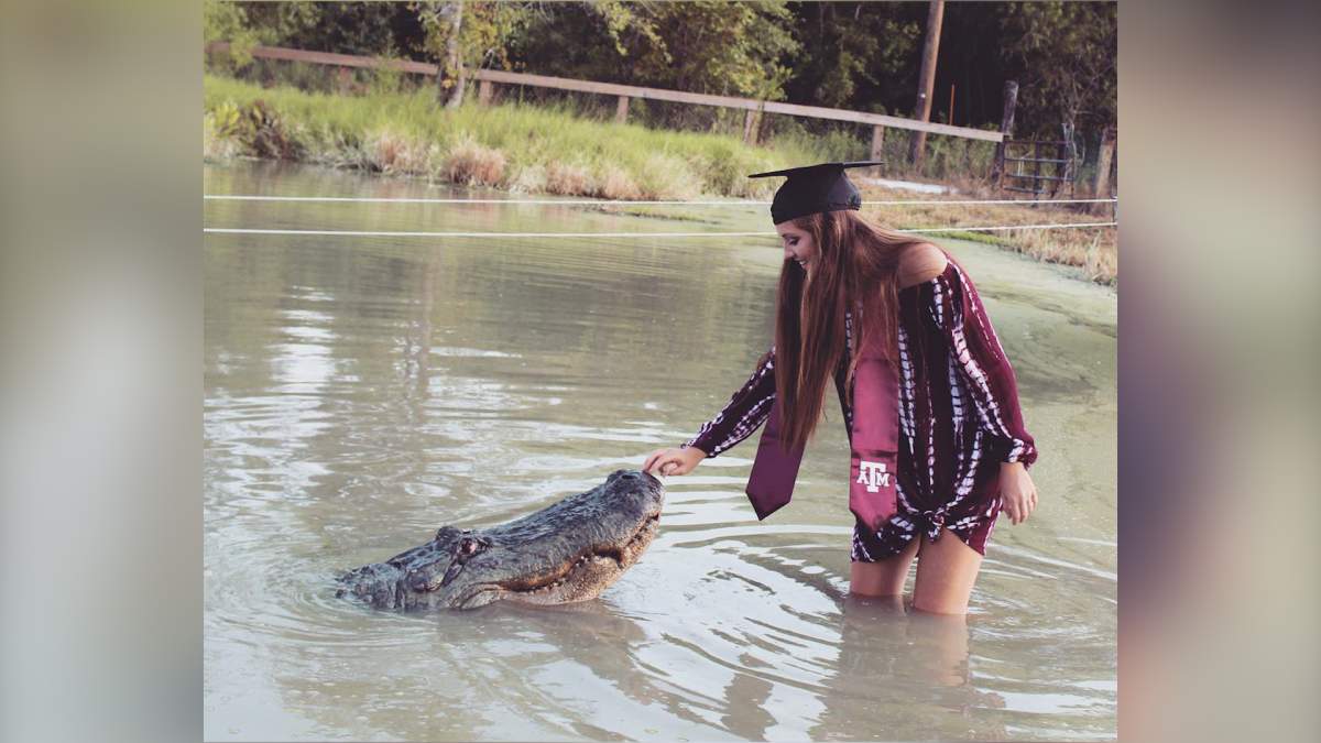 Internet snaps at Texas student who posed with alligator in grad photos - image