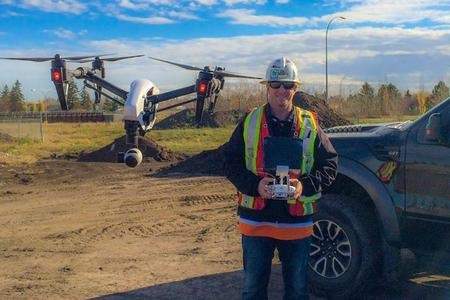 Mat Matthews, owner of BlackHawk Aeronautical Solutions, pictured with a drone.