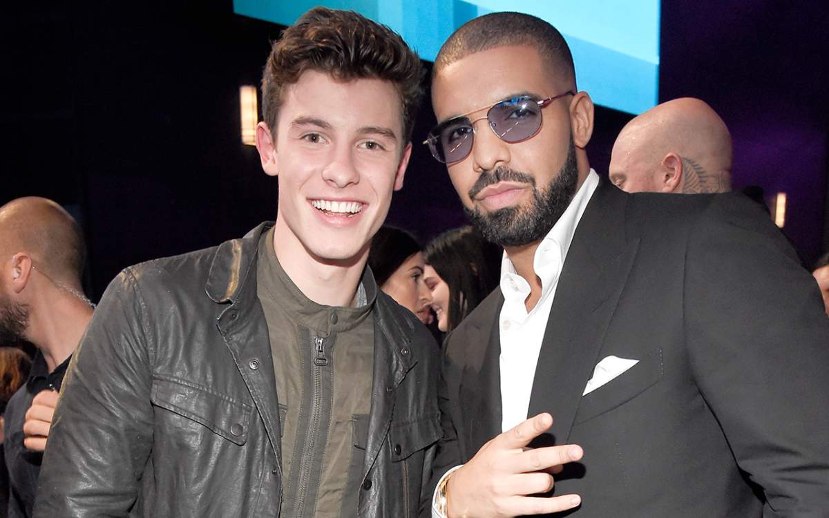 Canadian recording artists Shawn Mendes (L) and Drake perform onstage at the 2016 American Music Awards at Microsoft Theater on November 20, 2016 in Los Angeles, California. 