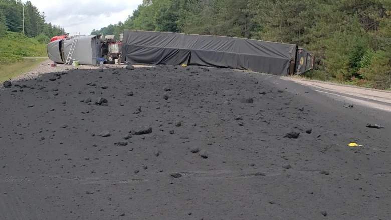 A trucker from Montreal has been charged with careless driving after the tractor-trailer he was operating lost control, rolled over and spilled its load of powdered nickel on Highway 17 near Deep River, Ont. on Wednesday afternoon.