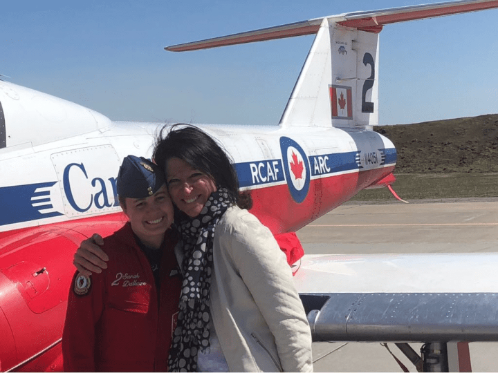 Captain Sarah Dallaire (left) & Maryse Carmichael (right) share a photograph on Dallaire’s selection day to become a Canadian Snowbird.