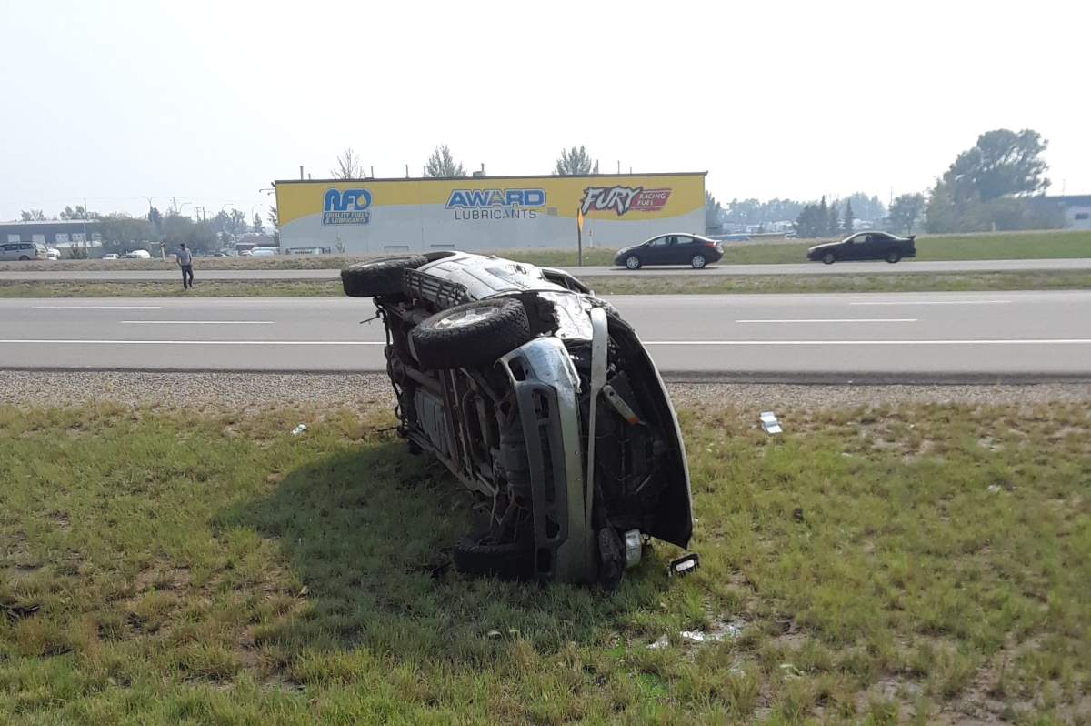 A teenage boy died after a stolen SUV fleeing from Strathcona County RCMP crashed just east of Edmonton on Sherwood Park Freeway on Tuesday, Aug. 14, 2018.