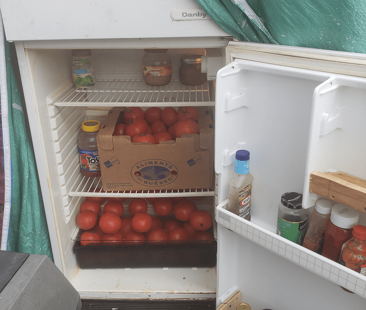 Darren James Gerbrandt says he's having trouble keeping his community fridge in Saint-Henri stocked. Wednesday, Aug. 15, 2018.