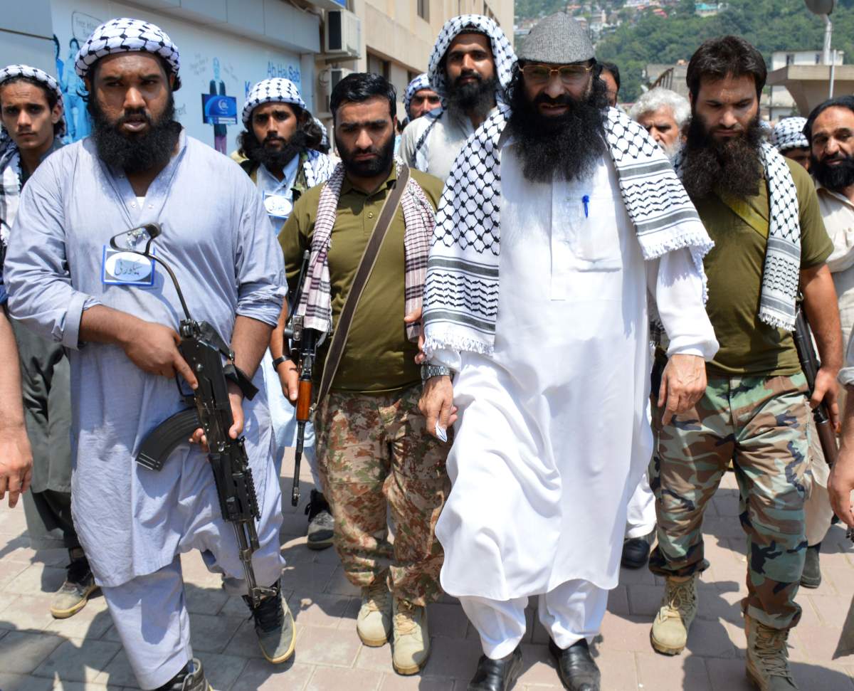 Syed Salahuddin (front right), leader of the Kashmiri militant group Hizbul Mujahideen, attends a rally in 2017. EPA/AMIRUDDIN MUGHAL