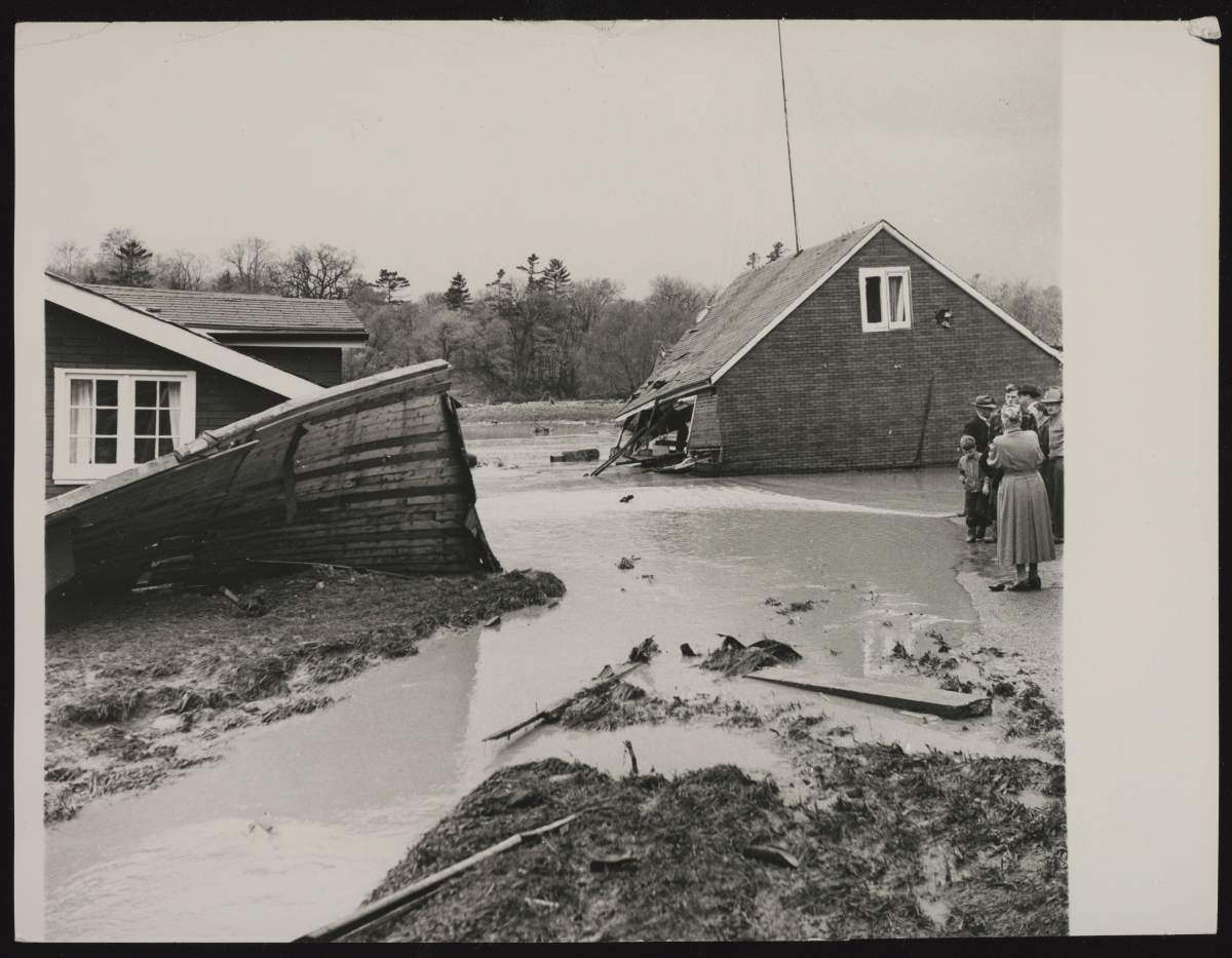 Homes jammed together by flood on Fairglen Rd., Weston.