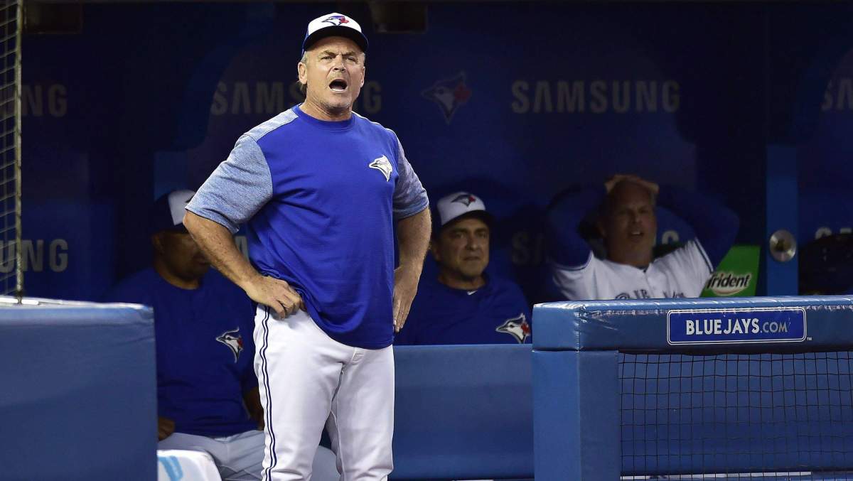 Toronto Blue Jays manager John Gibbons yells at the home plate umpire after a late 3rd strike call caused Kenrys Morales, not shown, to get caught out during sixth inning MLB baseball action against the Baltimore Orioles, in Toronto on Friday, July 20, 2018. 