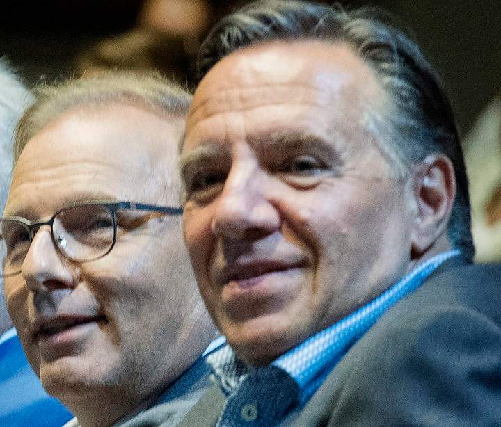 From left, Parti Québécois Leader Jean-François Lisée and CAQ Leader François Legault. Both leaders are promising to cut immigration to the province if elected. Sunday, Sept. 16, 2018.