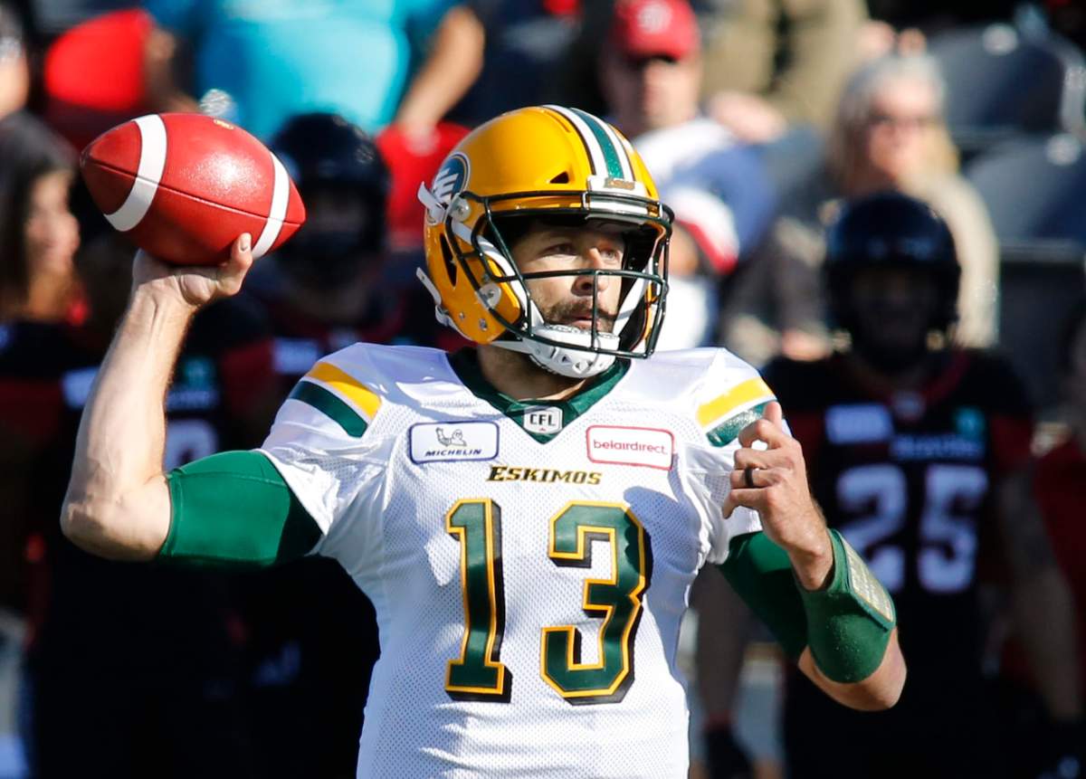 Edmonton Eskimos quarterback Mike Reilly (13) throws the ball during first quarter CFL action against the Ottawa Redblacks in Ottawa on Saturday, September 22, 2018.  (CFL PHOTO - Patrick Doyle).