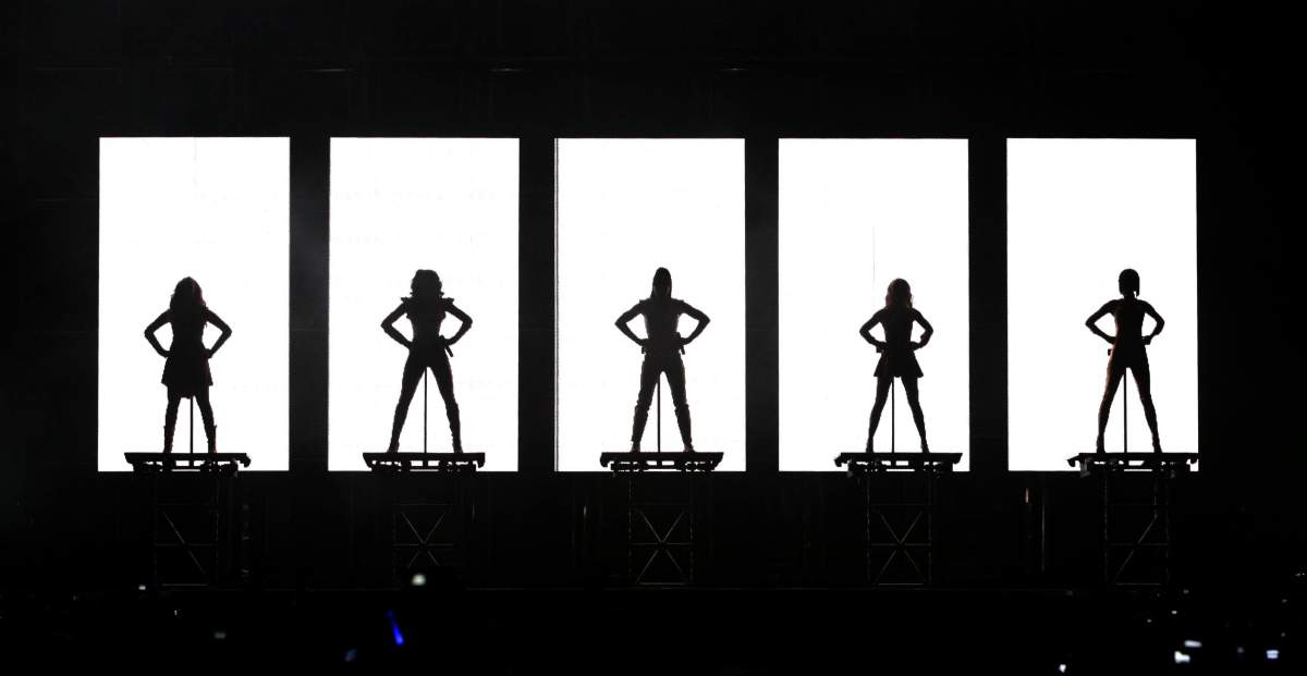 The Spice Girls perform onstage, during the London leg of their World tour, at the O2 Arena in London.