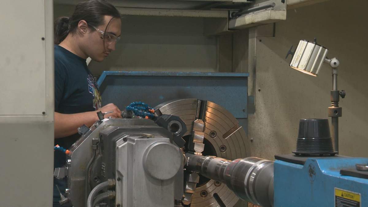 An employee pictured at Apollo Machine, an Alberta-based company struggling with Canada’s counter-tariffs.