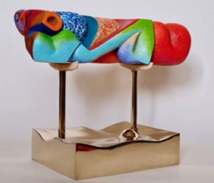 A sculpture by artist Robert Bigelow comprised of wood, bronze, oil, paint and leather.