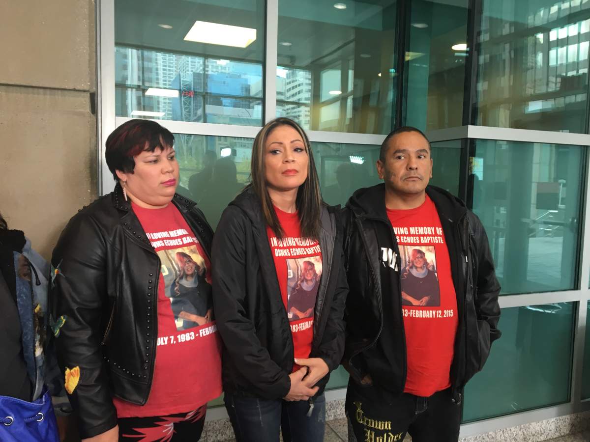 Family members of Calgary mother Dawns Baptiste at Calgary court Monday, Sept. 24, 2018 as her killer was sentenced.