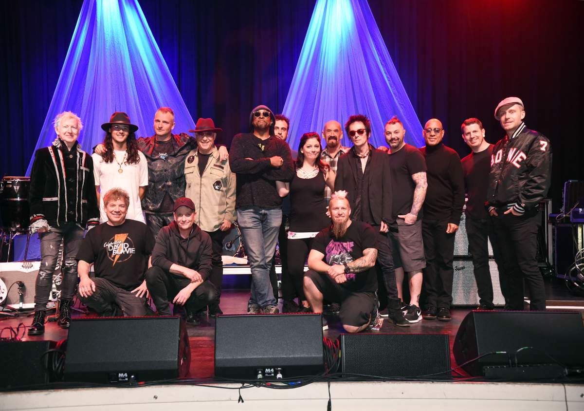 Band and crew pose for an end of tour photo prior to the Celebrating David Bowie concert at Buckhead Theatre on March 18, 2018, in Atlanta, Georgia.