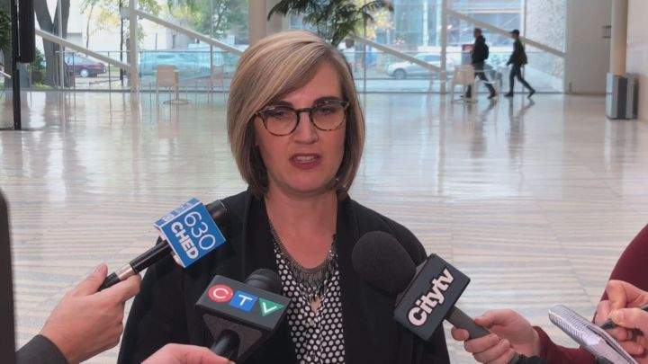 Cherie Klassen, the executive director of the Old Strathcona Business Association, spoke to reporters about Edmonton's potential new smoking rules on Wednesday.