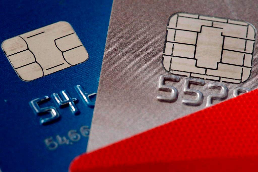 A Newfoundland woman has been charged after police said she used a stolen credit card to buy a winning lottery ticket.
