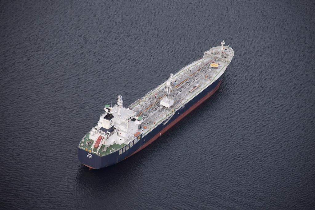 A tanker is anchored in Burrard Inlet just outside of Burnaby, B.C., on Friday, Nov. 25, 2016.