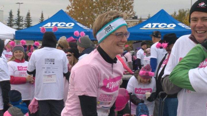 Kym Evans, breast cancer survivor runs at Calgary’s Canadian Cancer Society CIBC Run for the Cure.