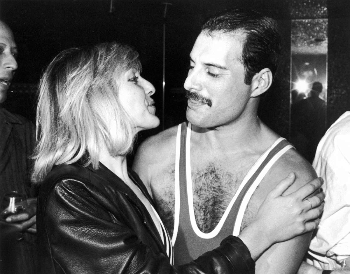 Freddie Mercury of British rock band Queen with his friend Mary Austin, during Mercury’s 38th birthday party at the Xenon nightclub, London, U.K.,