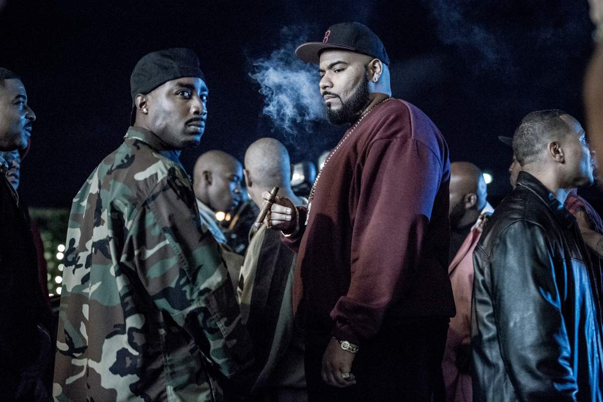 UNSOLVED: THE MURDERS OF TUPAC AND THE NOTORIOUS B.I.G. Marcc Rose as Tupac Shakur, Dominic Santana as Suge Knight.