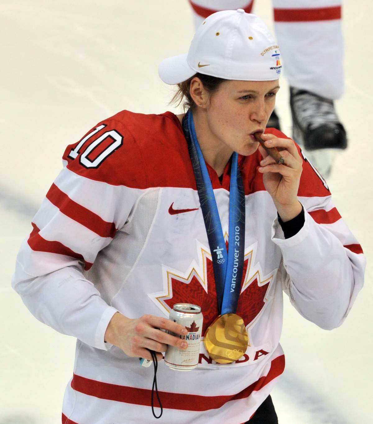 Gillian Apps celebrates following the medal ceremony during the XXI Winter Olympic Games in Vancouver on February 25, 2010. Canada beat the USA 2-0 to win the gold medal.