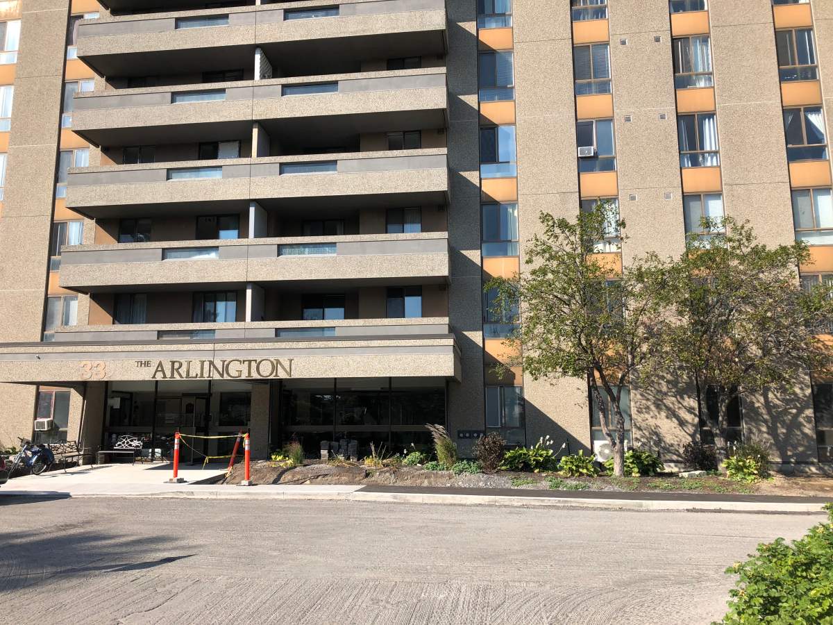 Residents at the Arlington Apartments at 33 Banner Rd. are among the last in the city without power by Monday. Despite that, the residents are in high spirits and have stepped up to help each other.