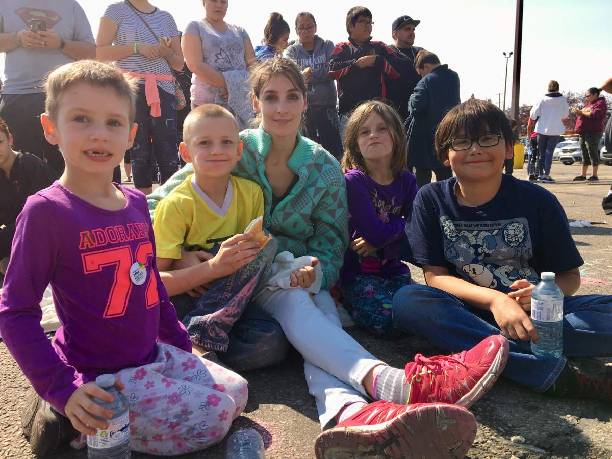 Christina Touzeau, a mother of six, said the event helps her family make ends meet.