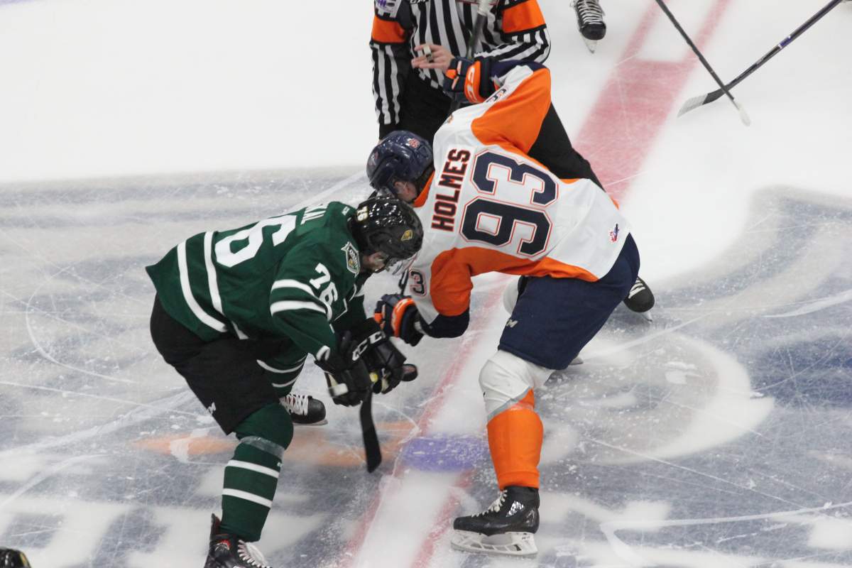 Billy Moskal and Hunter Holmes face-off in Flint.