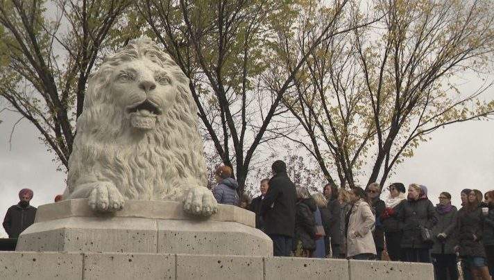 An iconic Centre Street lion sculpture found a new home in Rotary Park.