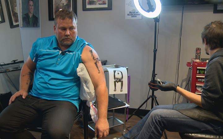 Before leaving Saskatoon for Humboldt, Scott Thomas added a fifth tattoo to remember his son who died in the crash.