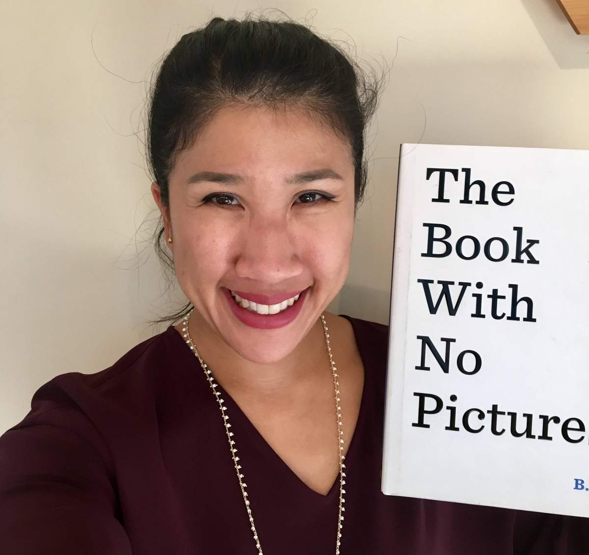 Sarah Chan with one of her favourite books to read to kids.