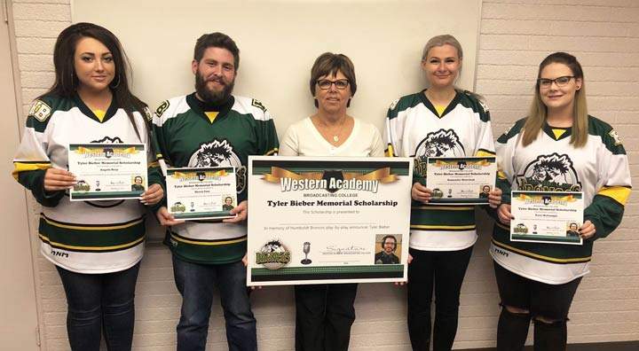 Angela Reay (far left), Shaun Foss (left), Samantha Matechuk (right), Kyra McGonigle (far right) received the Tyler Bieber Memorial Scholarship. Bieber’s mother Marilyn Hay (centre) assisted with the presentation.